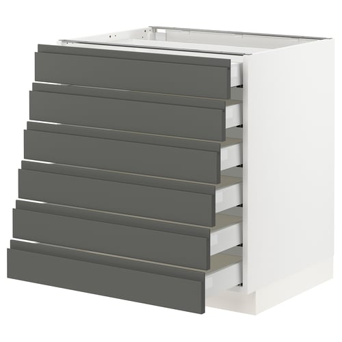 A white SEKTION kitchen cabinet with dark grey drawers, featuring a sleek modern design.