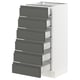 The SEKTION kitchen cabinet in white with dark grey drawers. Modern design, six drawers, smooth and sturdy build.
