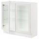 White SEKTION kitchen cabinet with glass doors and metal frames.