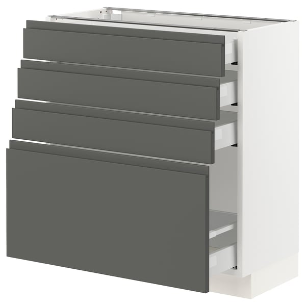 This image shows an ikea SEKTION kitchen unit with four grey drawers and a door, featuring integrated handles and a modern design.