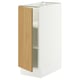 A white SEKTION cabinet with oak veneer door, sleek design, and adjustable shelves.