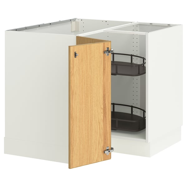 A SEKTION kitchen cabinet with wooden door, drawers, metal hardware, and white finish.