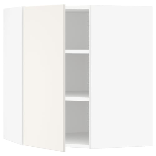 A white SEKTION corner kitchen cabinet with open doors, revealing adjustable shelves.