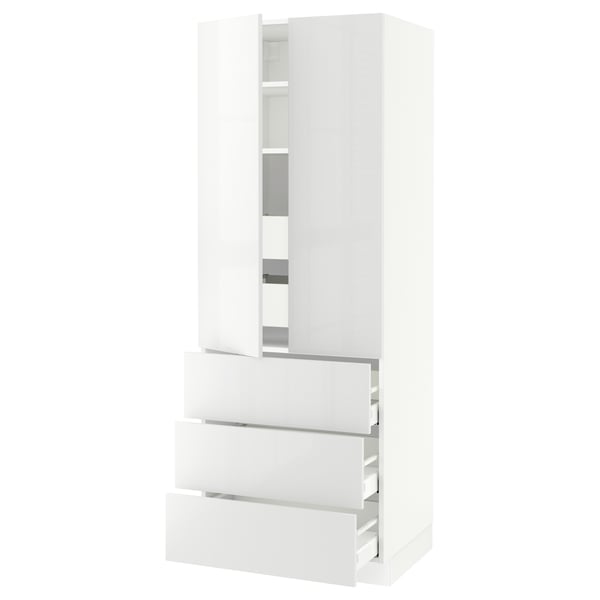 White SEKTION kitchen unit with drawers and shelves, glossy finish.