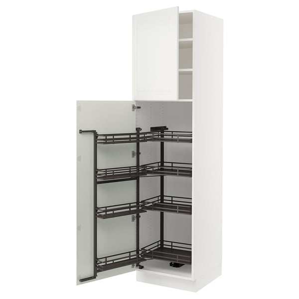 White kitchen cabinet with pull-out shelves and handle.