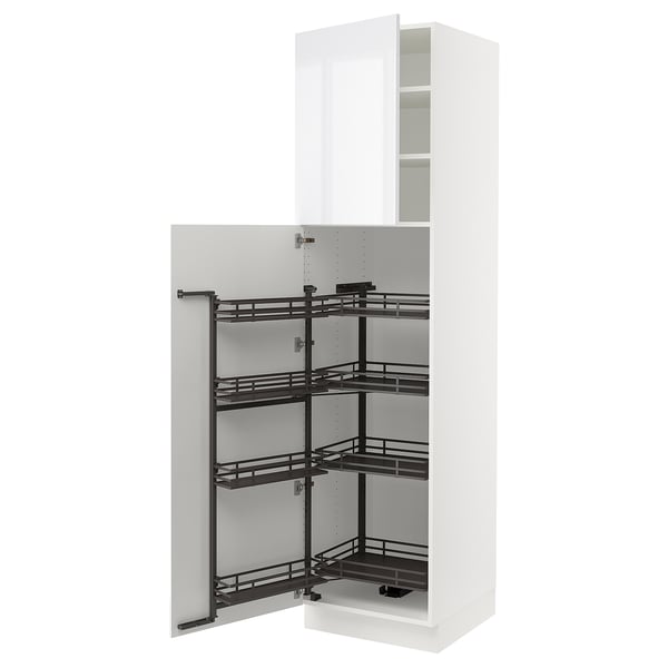 A white SEKTION kitchen cabinet with black pull-out shelves.
