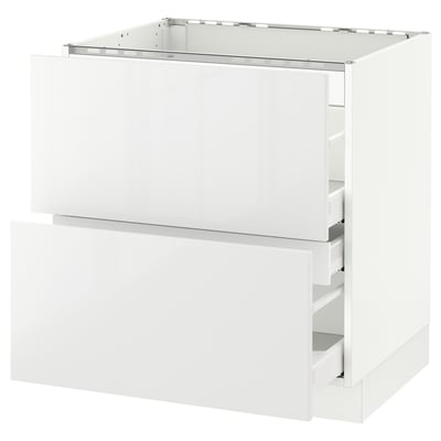 White, modern kitchen cabinet with metal handles, sleek design.