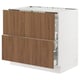 An ikea SEKTION kitchen cabinet with walnut-colored tistorp drawers. Its white and rectangular with smooth surfaces and modern design.