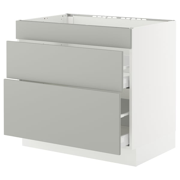 A SEKTION kitchen cabinet in light grey with a modern design and smooth-running drawers.