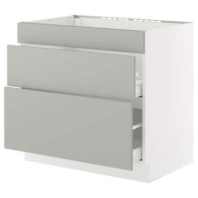 A SEKTION kitchen cabinet in light grey with a modern design and smooth-running drawers.