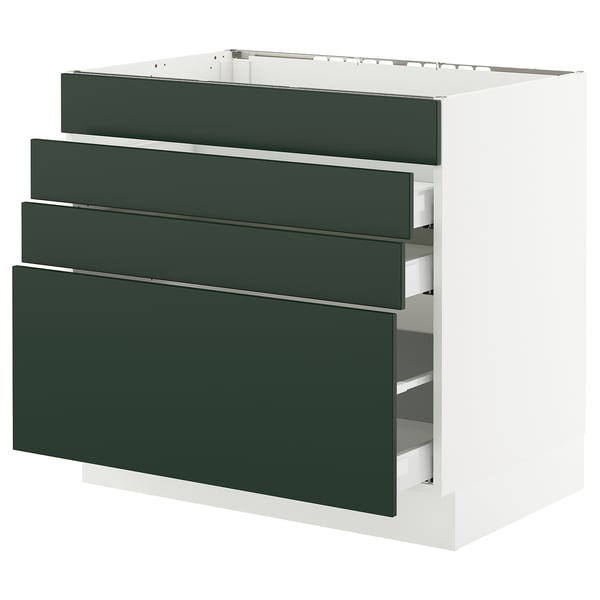SEKTION kitchen cabinet with green drawers.