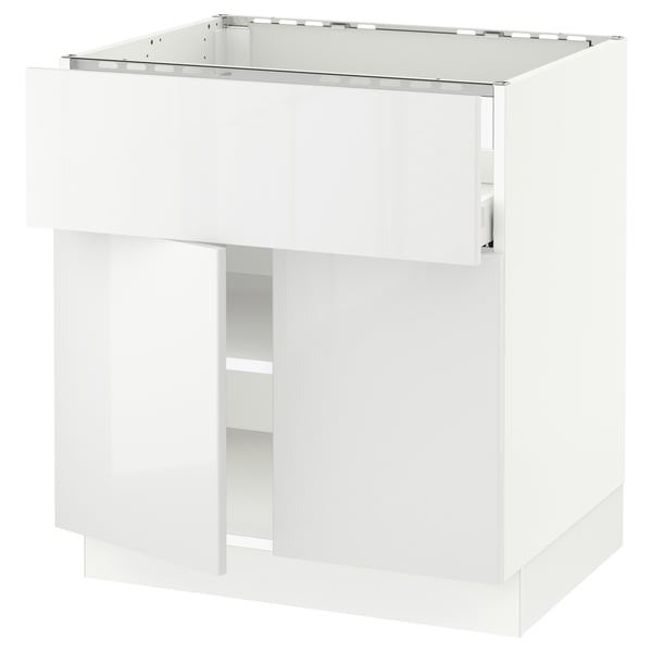 White SEKTION kitchen cabinet with modern design, glossy finish.