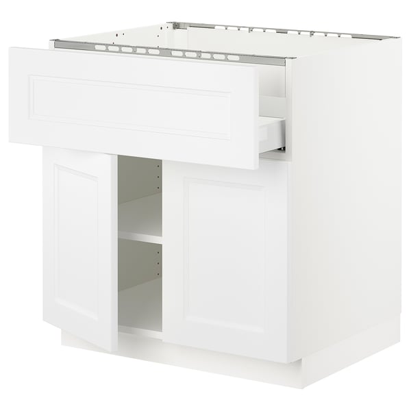White SEKTION kitchen cabinet with adjustable shelves and dampened hinges.