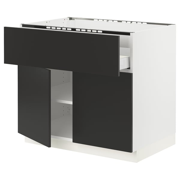 SEKTION kitchen unit in matt black and white, modern design with open section, made of particleboard and steel.