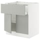 A light grey SEKTION kitchen cabinet with a modern design. It has a drawer with a built-in damper and an adjustable shelf.