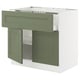 Modern olive green kitchen cabinet with white interior, open doors, and adjustable shelf.