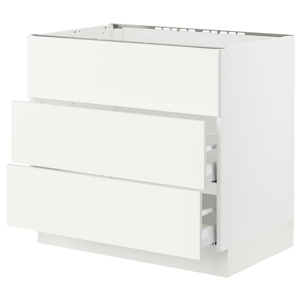 White SEKTION kitchen cabinet, three drawers, sleek modern design.