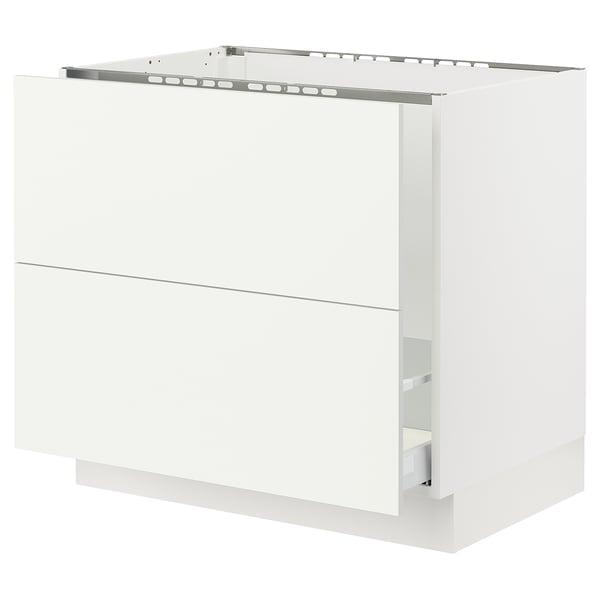SEKTION white kitchen cabinet with two drawers and metal railings, sleek modern design.