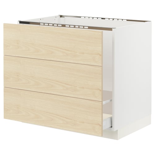 Modern light wood cabinet with sleek handles and white base, part of IKEAs SEKTION kitchen system.