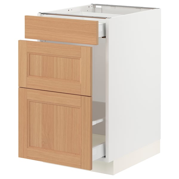 SEKTION kitchen cabinet, oak fronts, 2 drawers, door, mounted on white base.