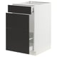 Modern kitchen unit with white cabinet and black drawers, sleek and minimalist design.