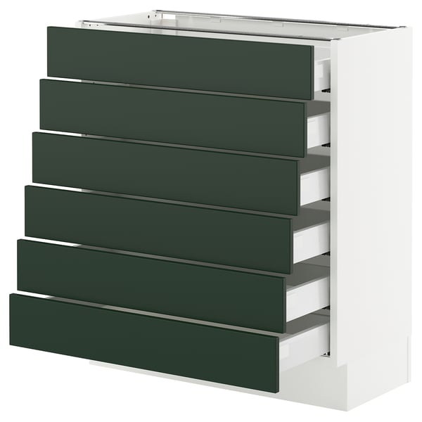 SEKTION kitchen unit: green drawers, white base, modern design.