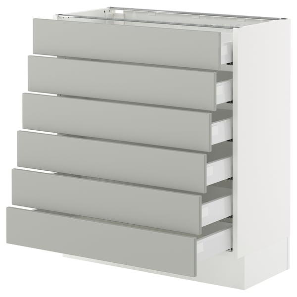 White SEKTION kitchen unit with six grey drawers, modern design.