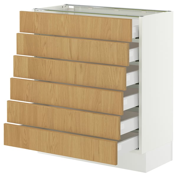 SEKTION white cabinet with six wooden drawers.