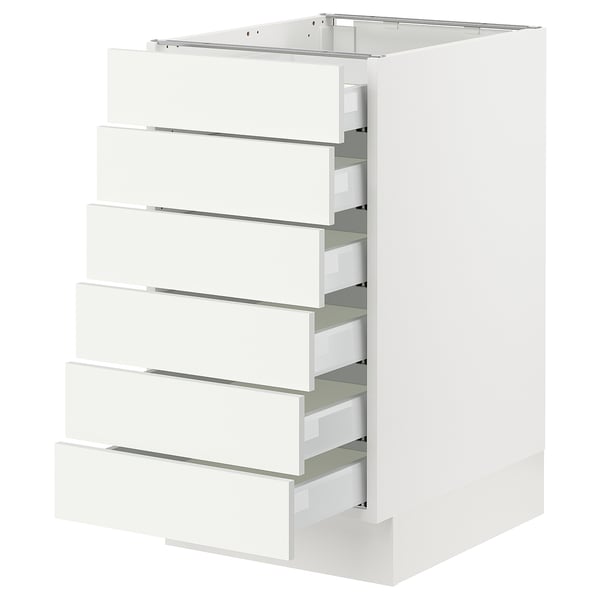 Ikea SEKTION white kitchen cabinet with five drawers.