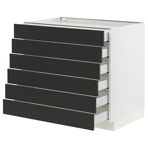 Modern kitchen unit, white and black, six drawers, minimalist design.