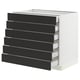 Modern kitchen unit, white and black, six drawers, minimalist design.