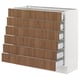 A modern white SEKTION kitchen cabinet with six walnut-colored drawers. It has a sleek design with smooth surfaces.