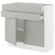 A SEKTION kitchen cabinet in light grey with an open drawer and shelf.