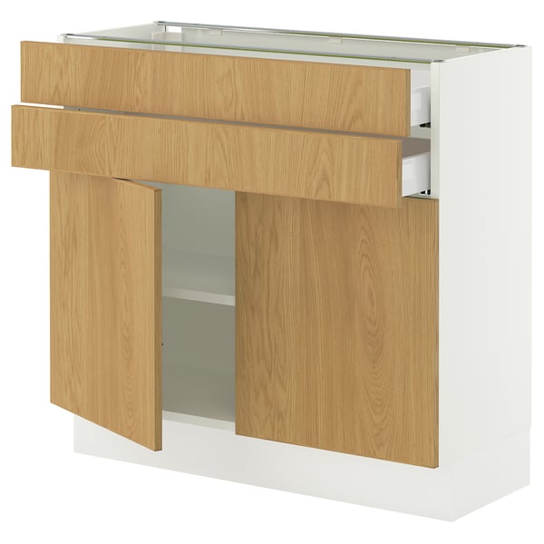 SEKTION kitchen cabinet in oak and white. Modern design with adjustable shelves and soft-closing doors.