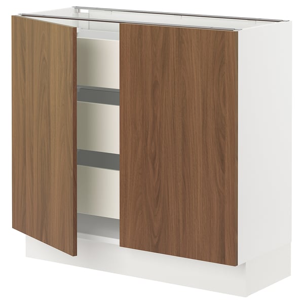 An open white cabinet with dark wooden doors, featuring a modern design with two shelves inside.