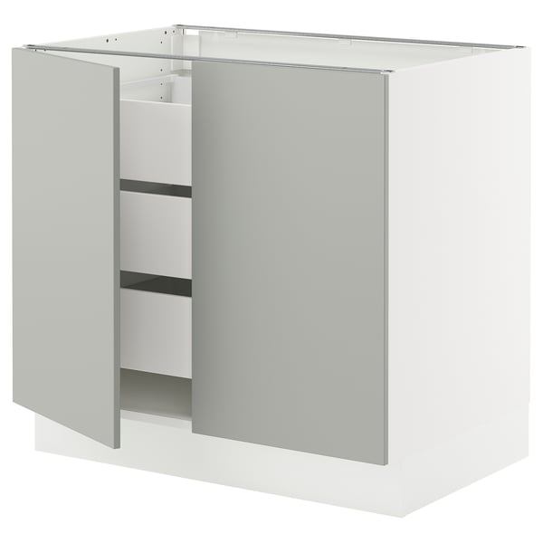 White SEKTION kitchen cabinet, modern design with light grey door.