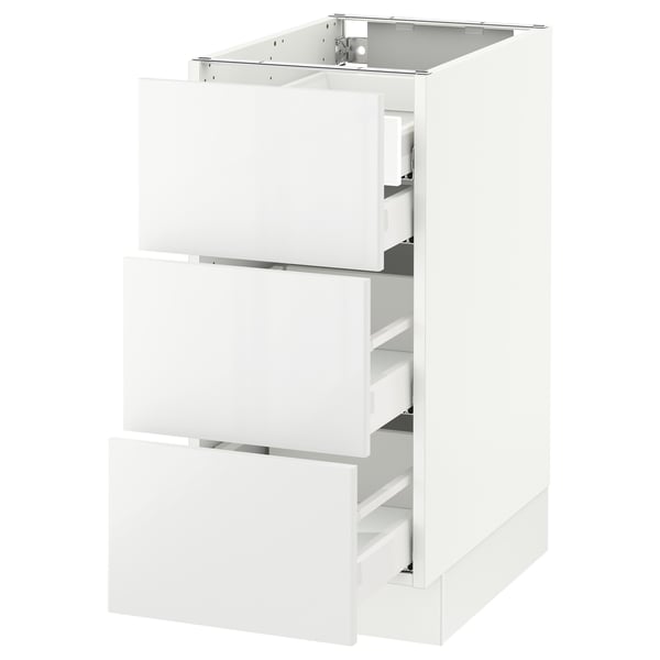 White SEKTION kitchen cabinet with three glossy drawers, modern design.