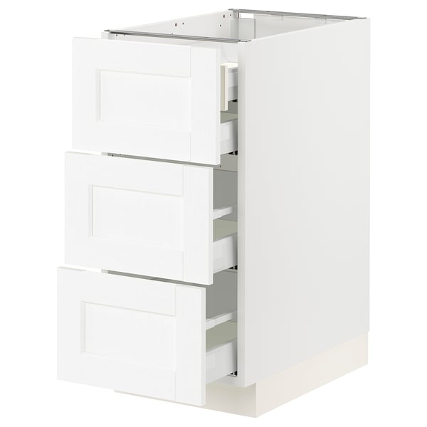 SEKTION white cabinet with pull-out drawers.