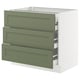 An olive green three-drawer cabinet with a white base, part of IKEAs SEKTION kitchen system.