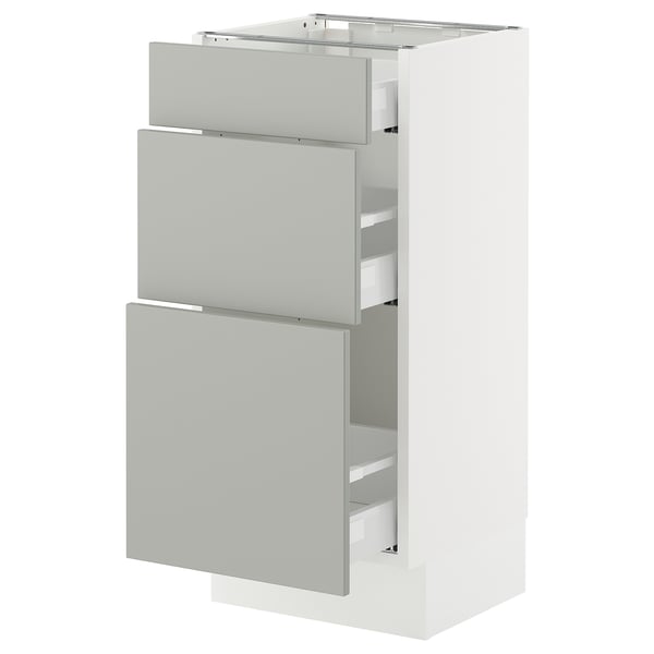 Ikea SEKTION, white cabinet, light grey drawers, modern clean design.