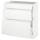 A white SEKTION kitchen cabinet with three drawers and a countertop. It has a sleek, modern design with smooth drawer faces and integrated handles.