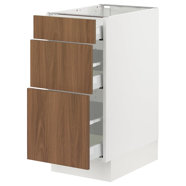 SEKTION kitchen cabinet in white with walnut drawers, modern smooth design, sturdy and stylish storage solution.