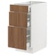 SEKTION kitchen cabinet in white with walnut drawers, modern smooth design, sturdy and stylish storage solution.