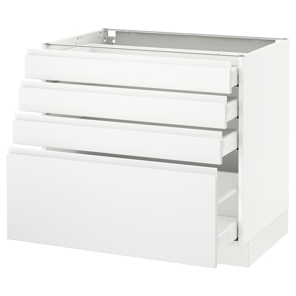 Modern white kitchen cabinet with sleek, handle-less drawers in minimalist design.