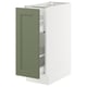 A SEKTION kitchen cabinet with a green axstad door, featuring pull-out shelves. It’s rectangular with a sleek design.