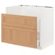 White kitchen cabinet with oak drawers.