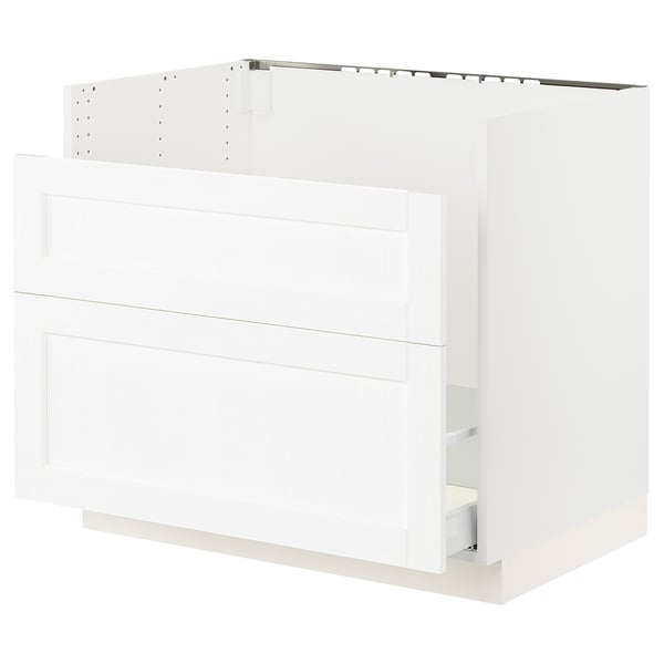 White kitchen cabinet with drawer, glossy finish, modern design.