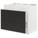 Modern kitchen cabinet, white with black drawers, sleek design.