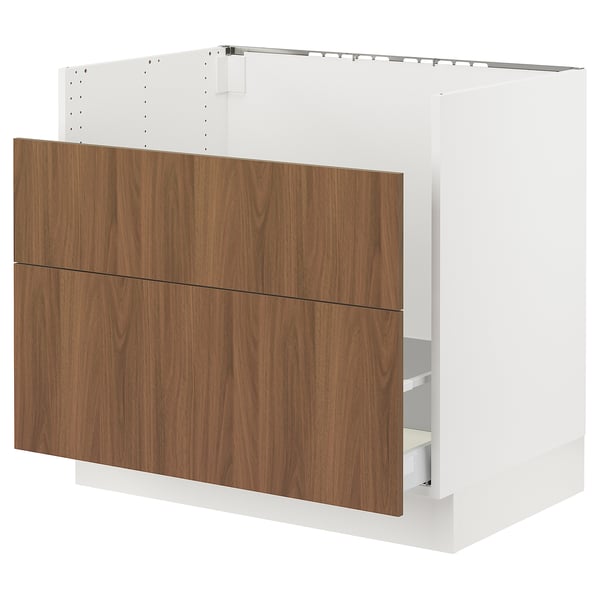 White and wooden kitchen cabinet, smooth and modern, with two drawers and a door, using sturdy materials.