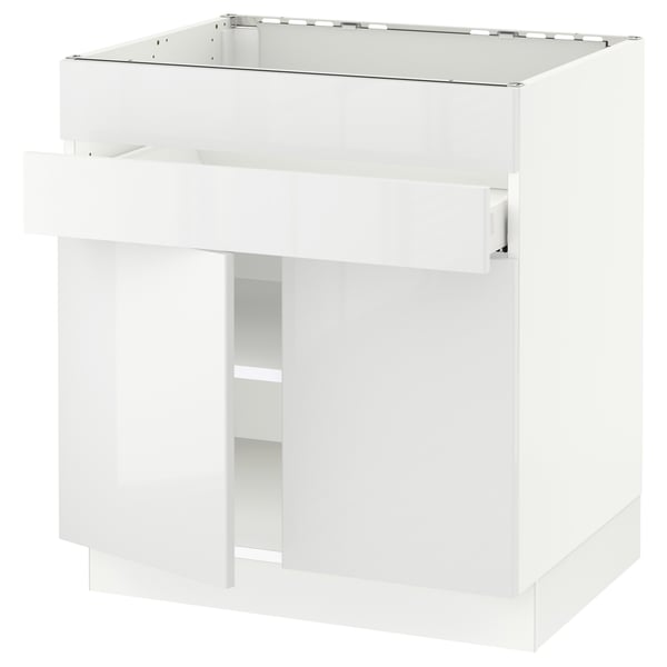 A white SEKTION kitchen cabinet with glossy doors and a modern design.